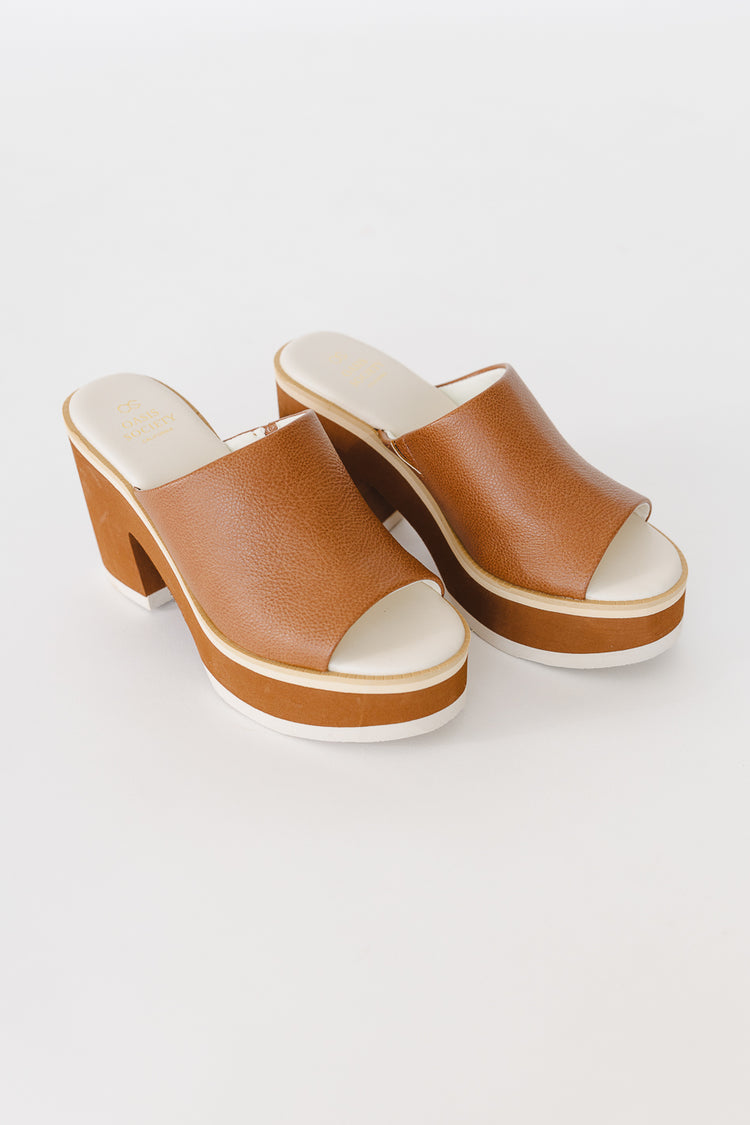 Brown and white platform heels