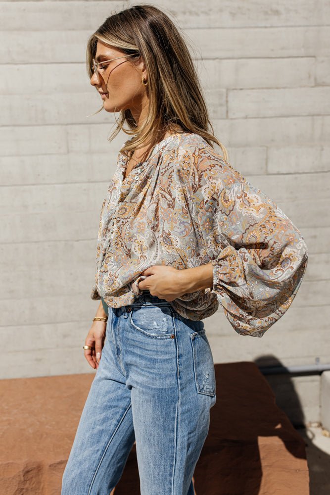 floral blouse with denim jeans