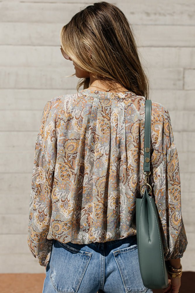 back view of floral blouse