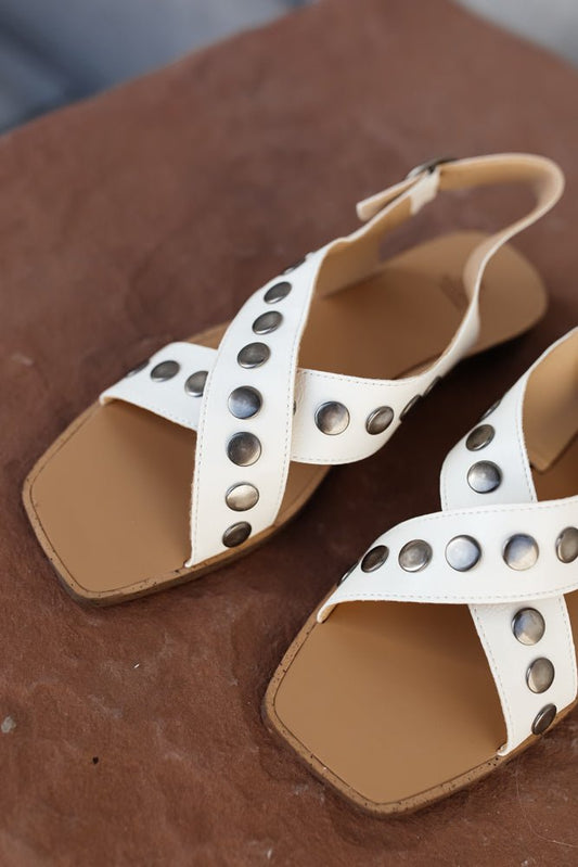 white sandals with stud details