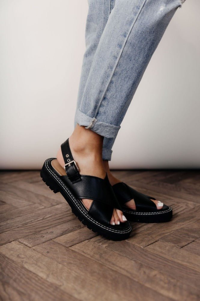 black sandal with adjustable strap