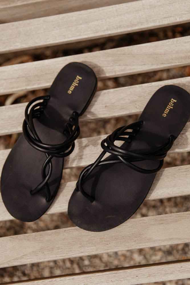 black twisty strap sandals