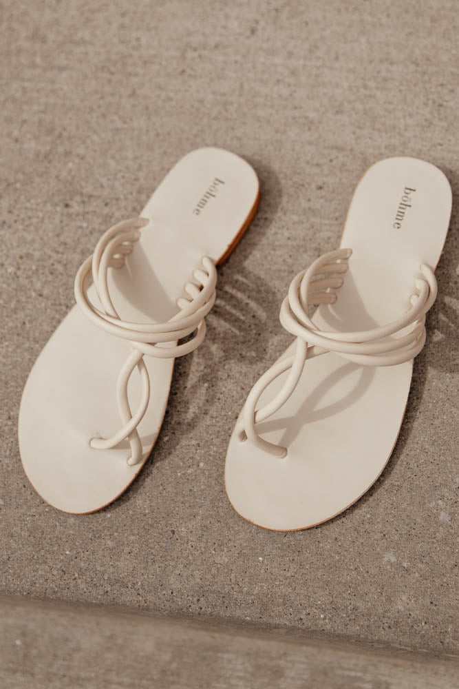white sandals with twisted straps