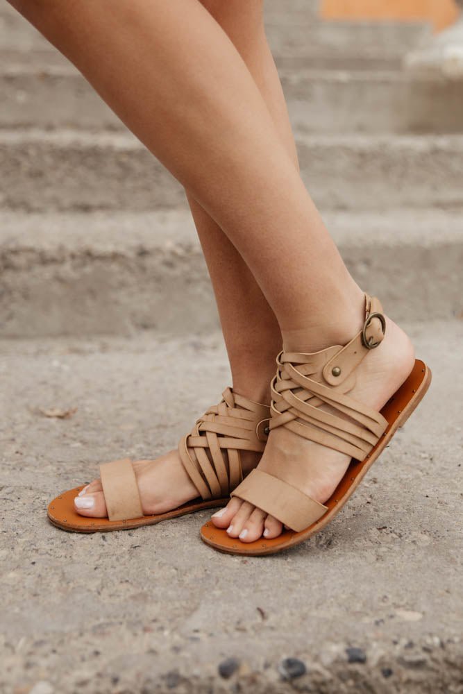 tan sandals with stud details
