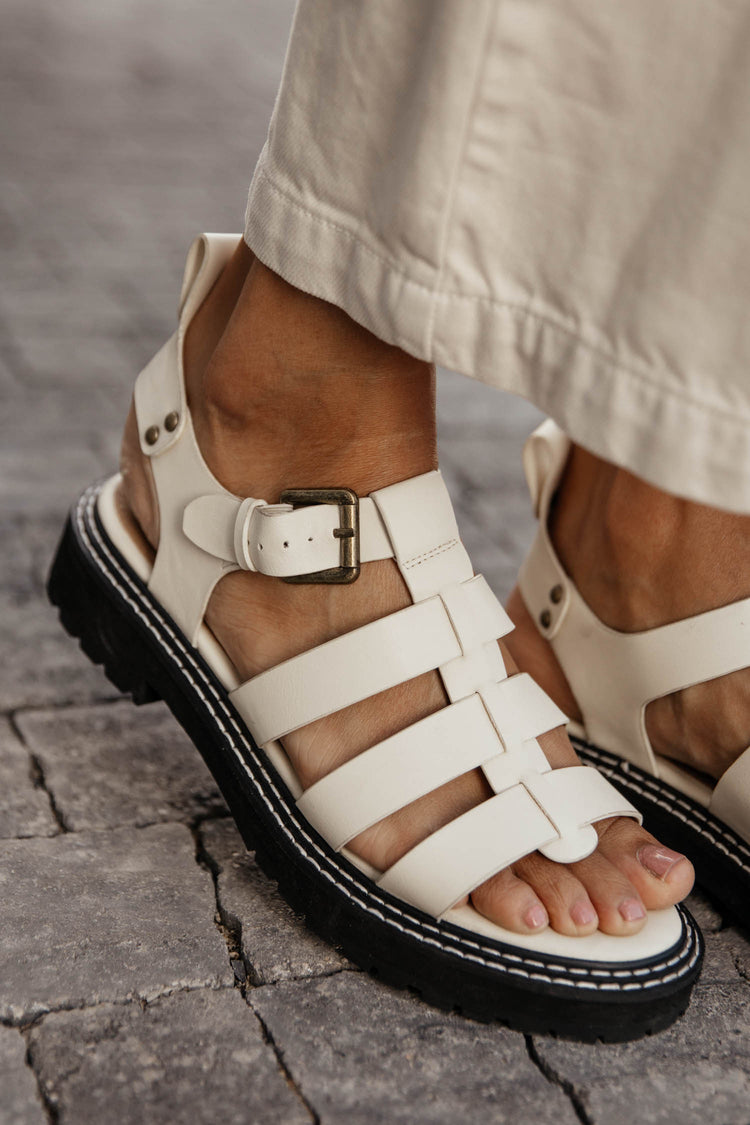 cream sandal with buckle detail