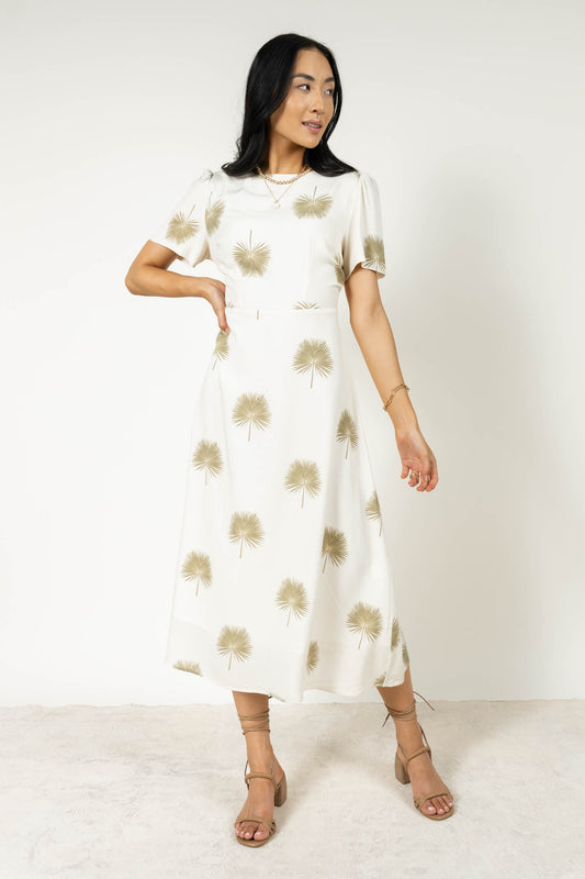 Cream printed dress with green leaf detail