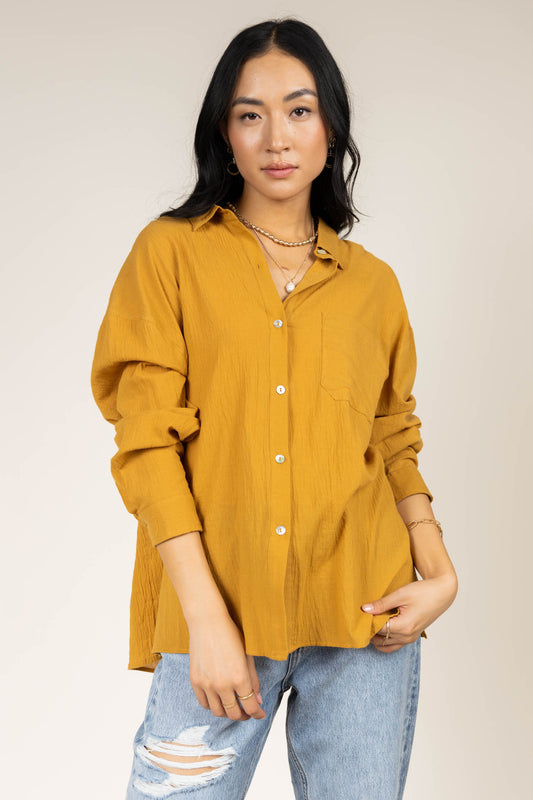 mustard button down with front pocket