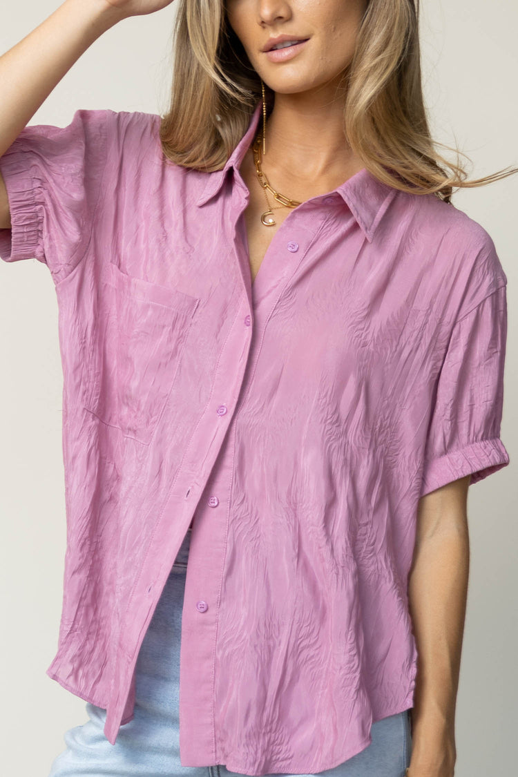 pink button up with elastic short sleeves