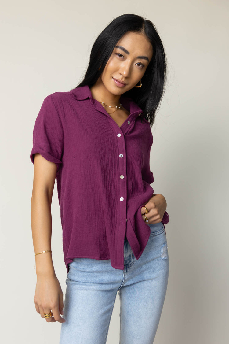 short sleeved collared button down top