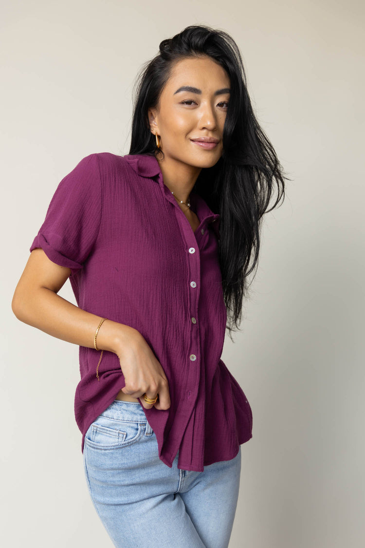 purple button up with short sleeves