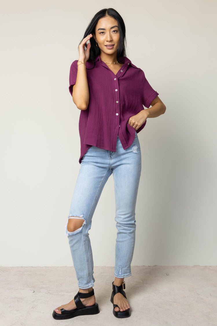 short sleeve purple top with button front detail