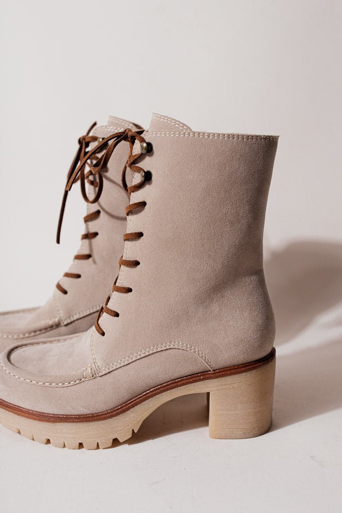 The Maeve Combat Boots have a gum platform and heel with a faux suede upper and laces.