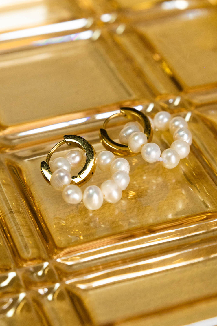 huggie gold hoop earrings with pearls