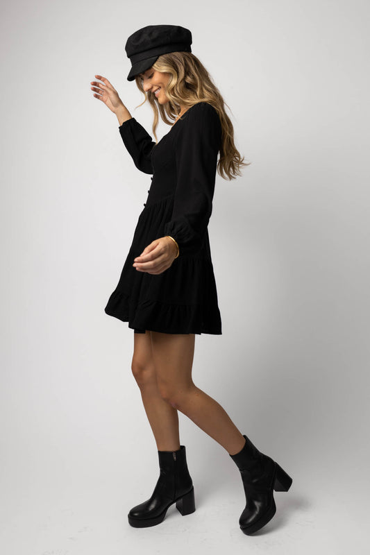 mini dress with cabby hat and black boots