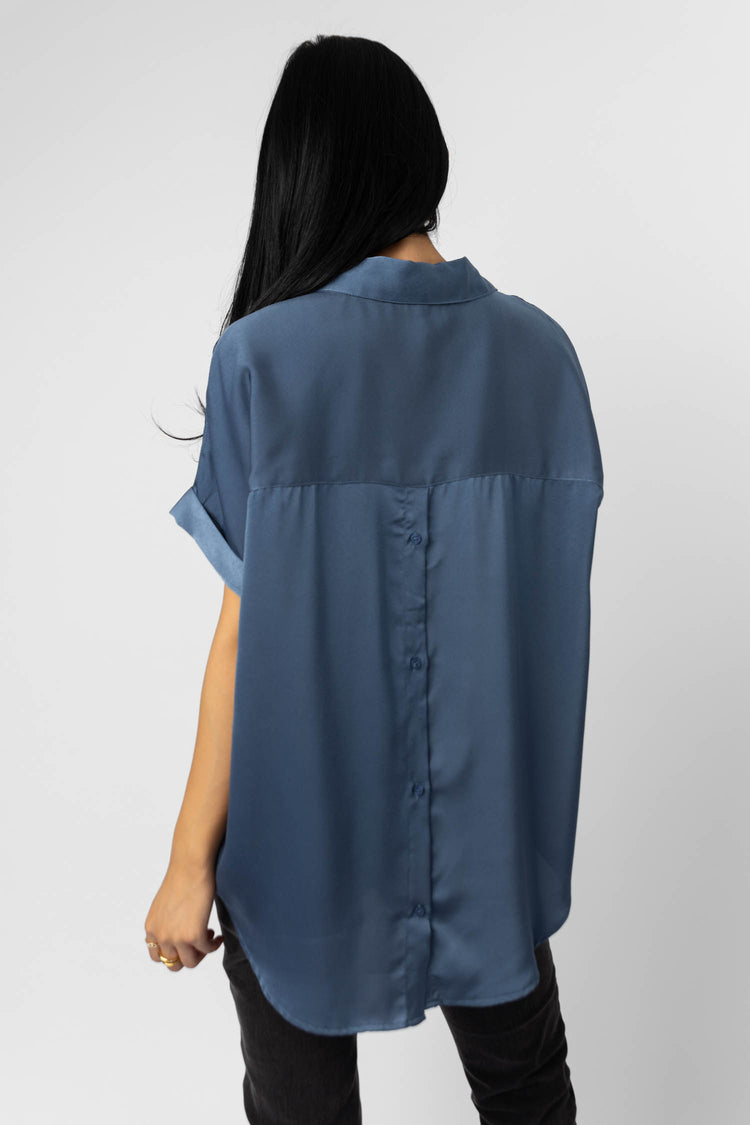 satin blue blouse with short sleeves
