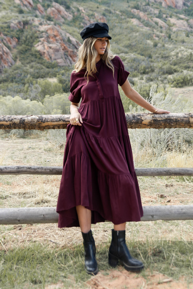 tiered dress with boots and cabby hat