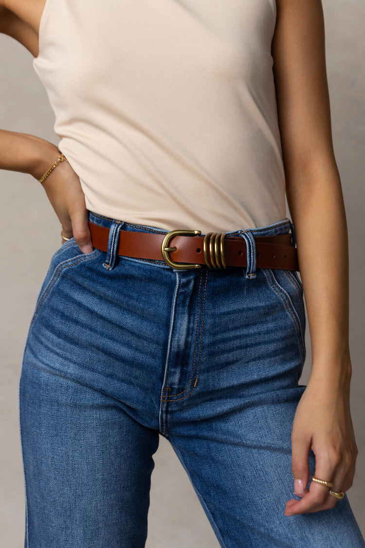leather belt with gold hardware