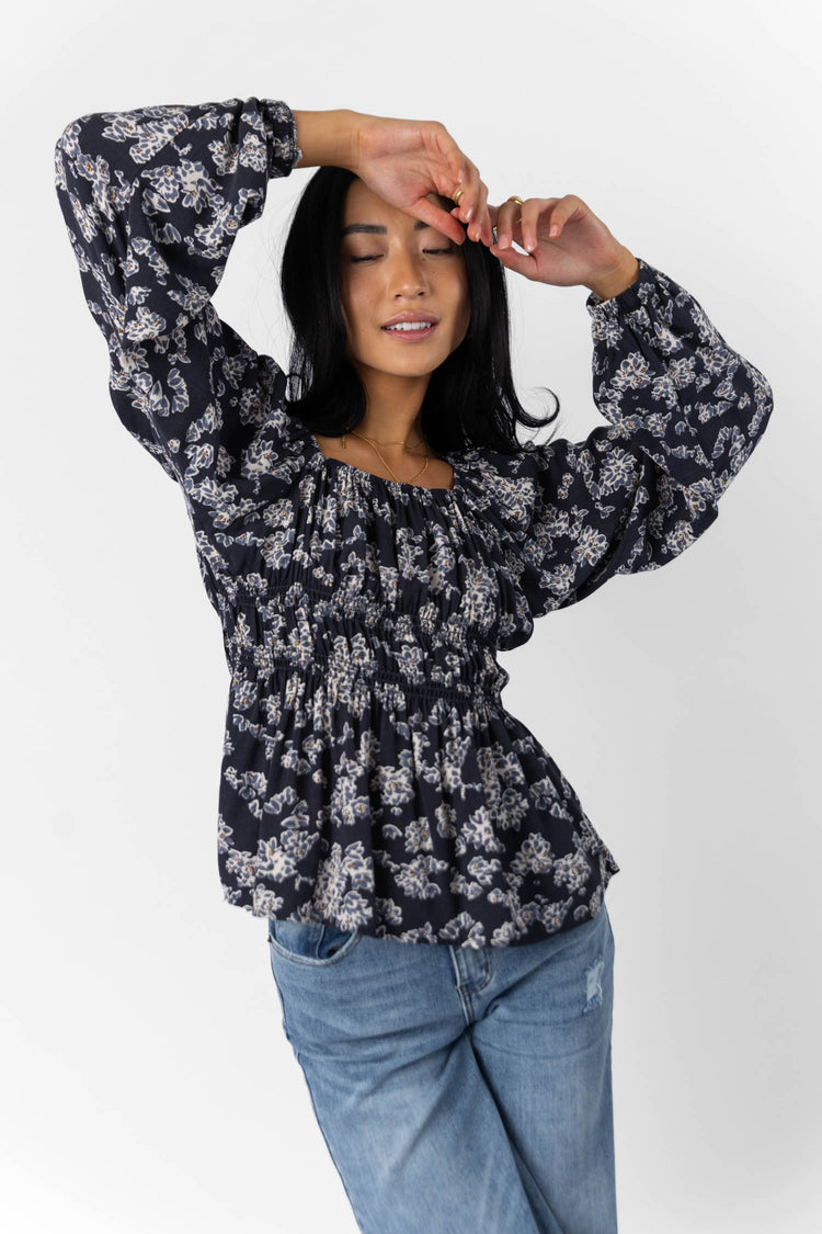 navy blouse with floral detail