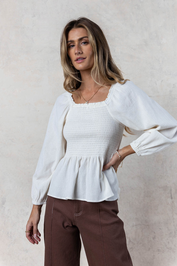 peplum blouse with long sleeves