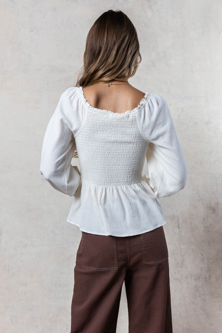 cream blouse with square neck