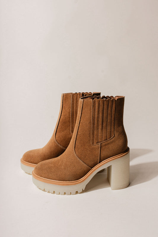 The Anastasia Platform Boots are the perfect boots to wear this fall season. Get yours now and get outfitted for fall!