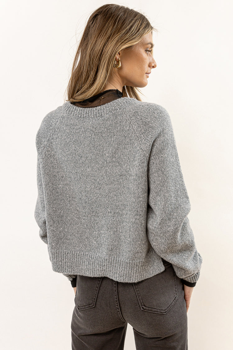 grey knit sweater with side slits