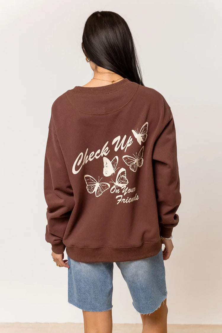 brown butterfly graphic sweatshirt