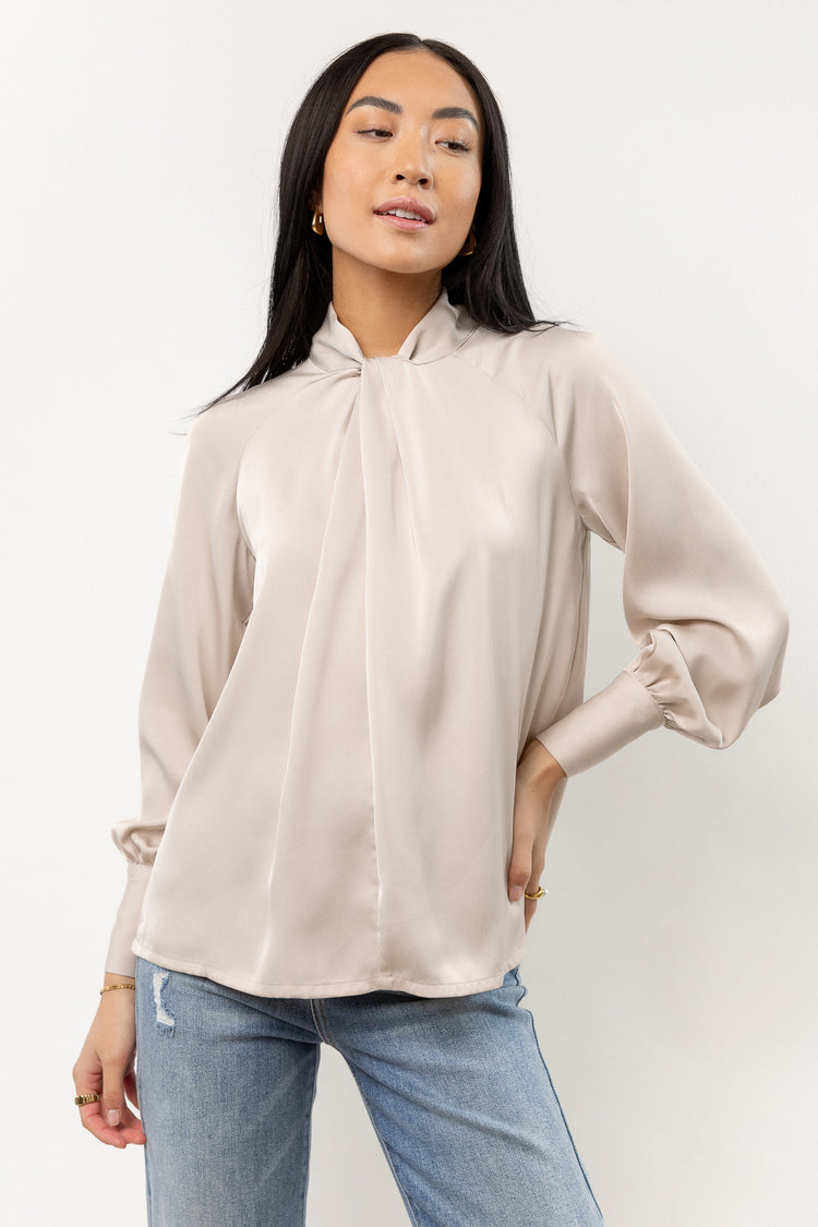 cream satin blouse with twist detail