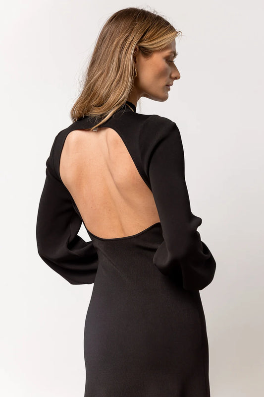 black dress with open back detail