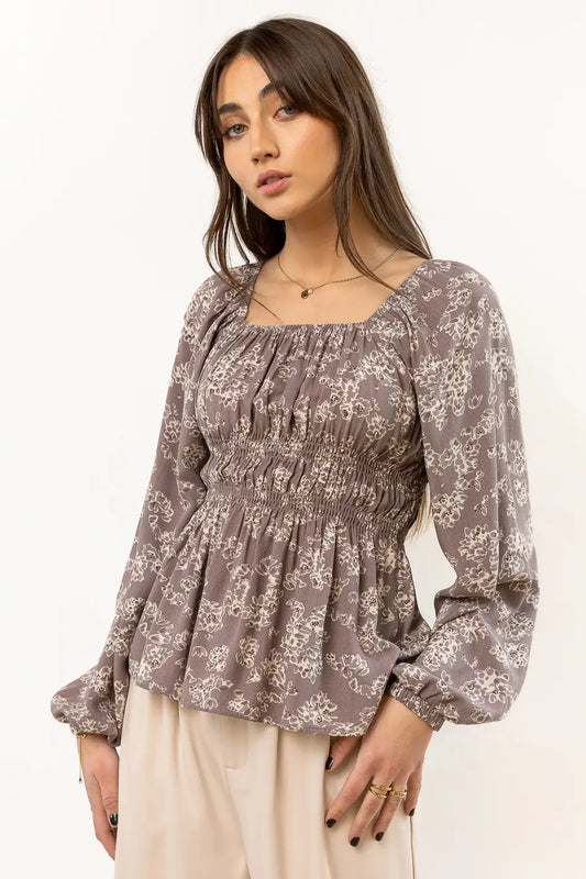 grey floral blouse with smocked detail