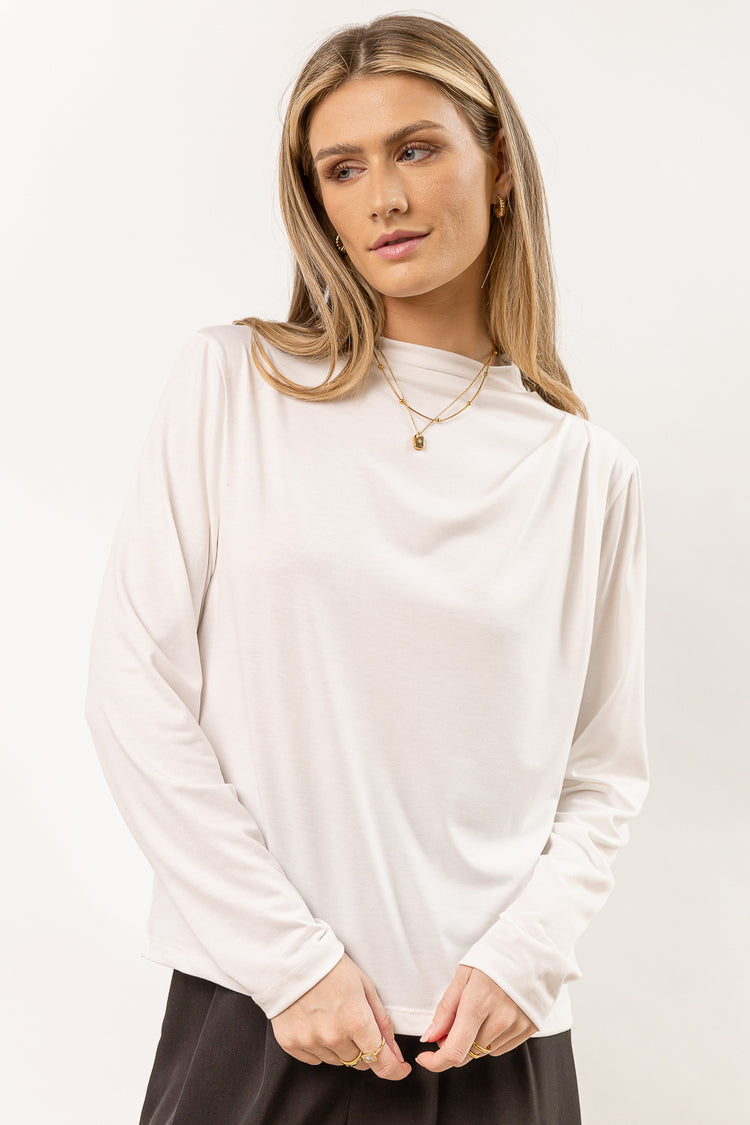 long sleeve white shirt with shoulder detail
