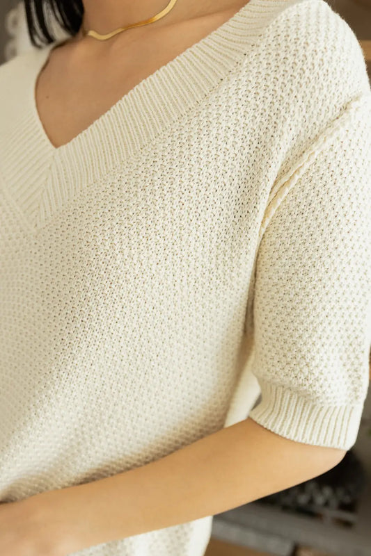 close up of oatmeal waffle knit top