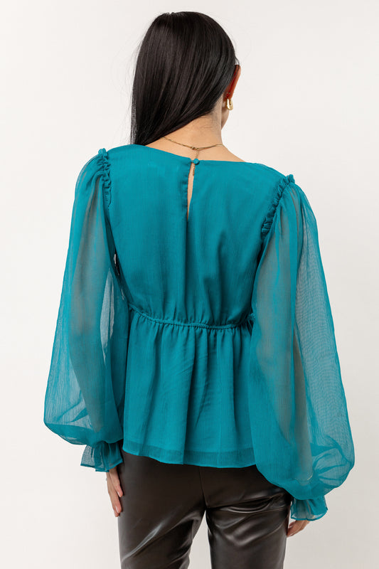 peplum blouse with sheer sleeves