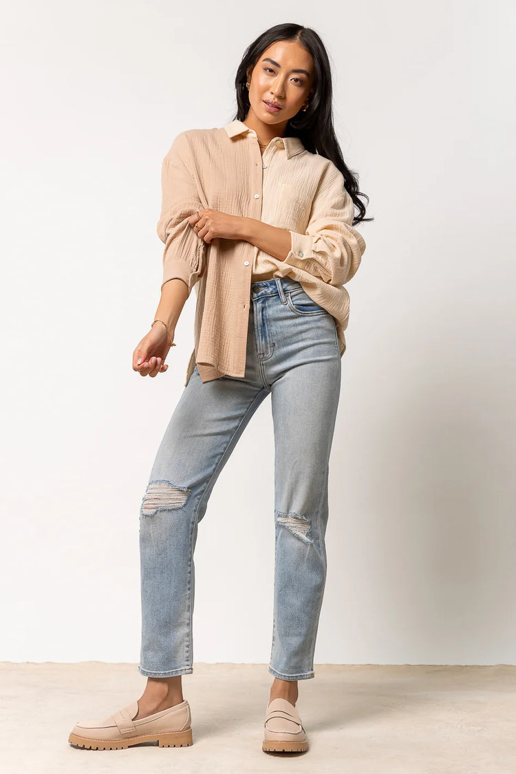 taupe button paired with light wash denim