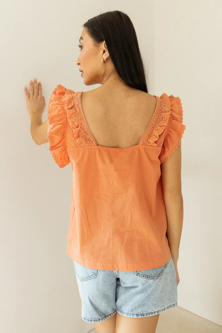 orange short sleeve top with square back 