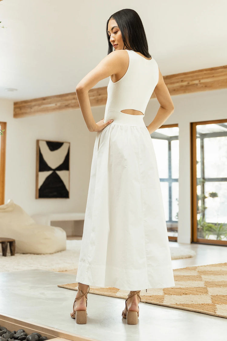 back side of white midi dress with cut out back 