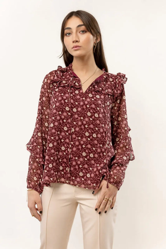 long sleeve floral blouse with shoulder ruffle detail