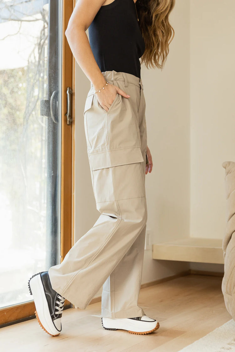 tan cargo trousers paired with black tank