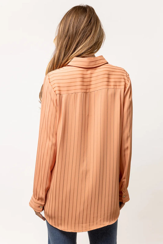 orange long sleeve button down with pin stripes