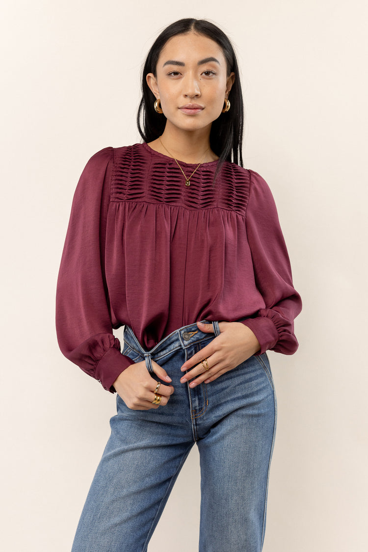 burgundy blouse with round neck