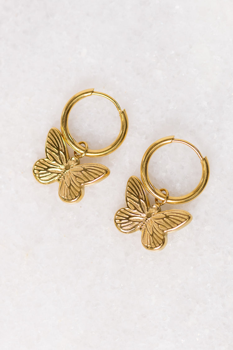 gold hoop earrings with butterfly charm