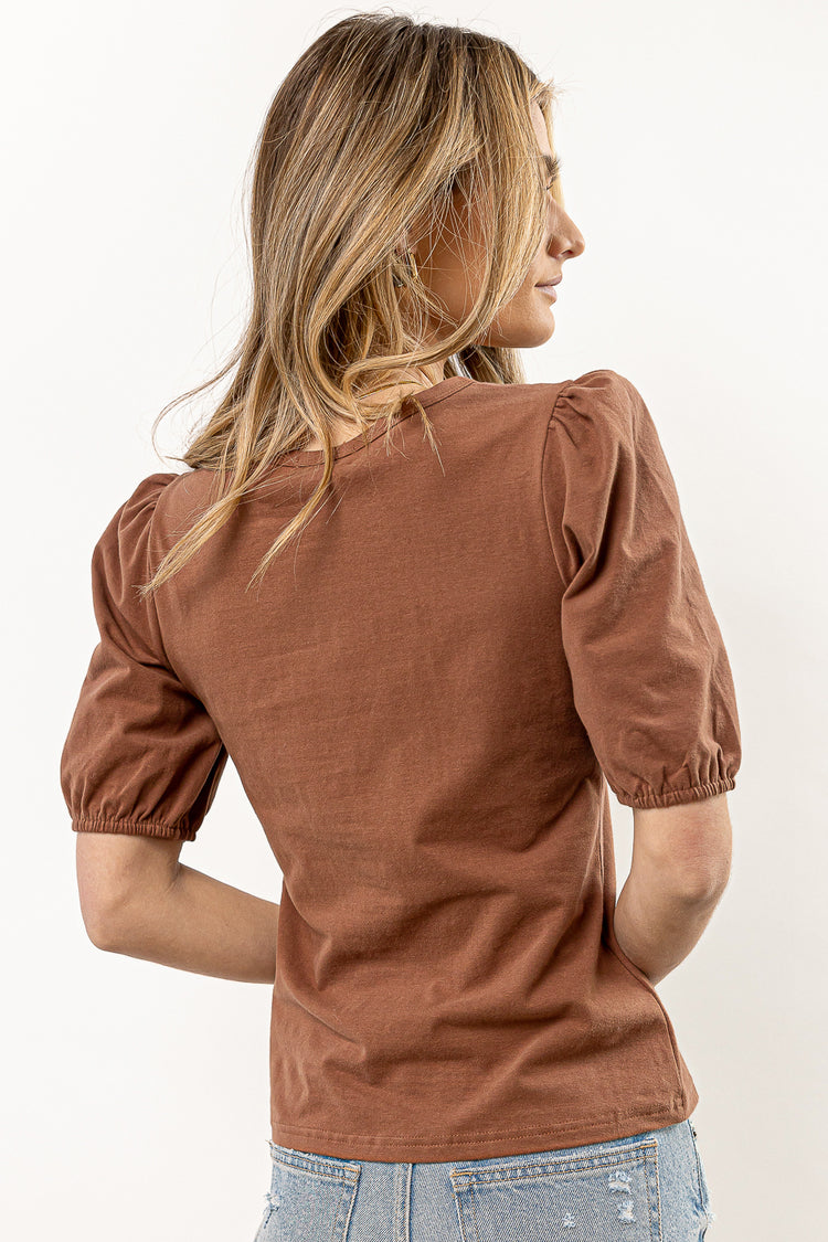 brown short sleeve shirt with round neck