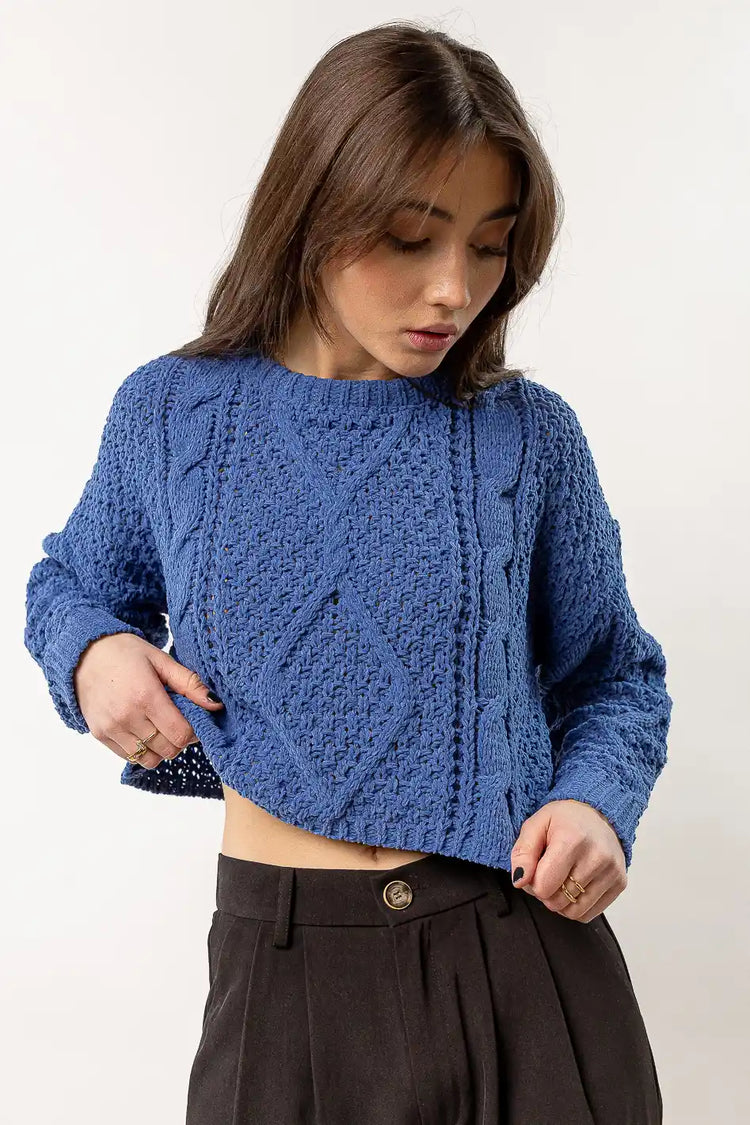 blue cable knit sweater