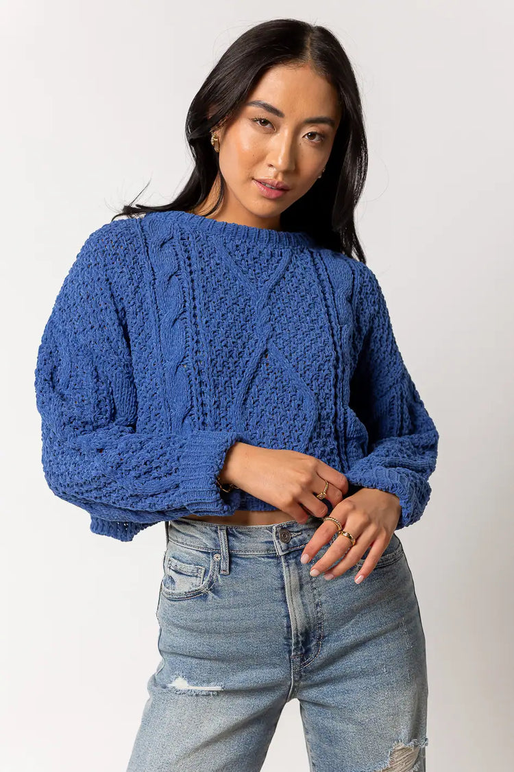blue cable knit sweater