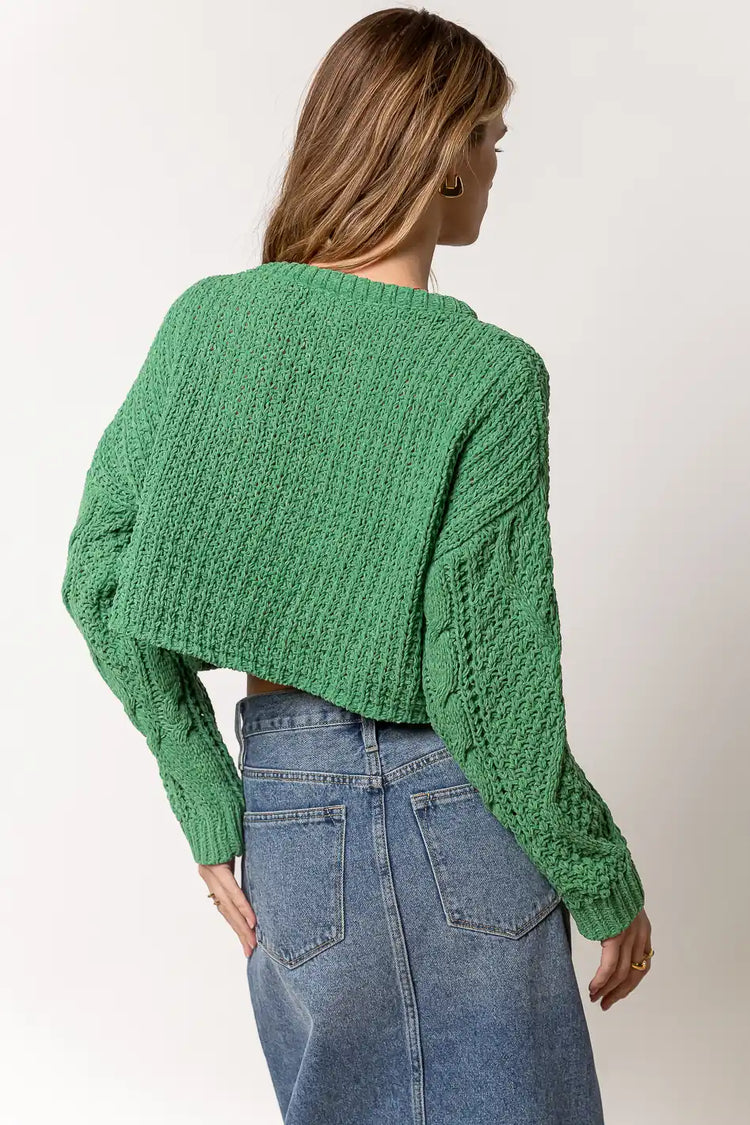 green sweater with round neck