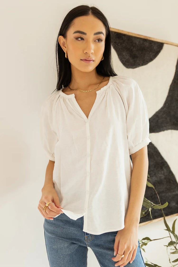 white button up blouse with puff sleeves