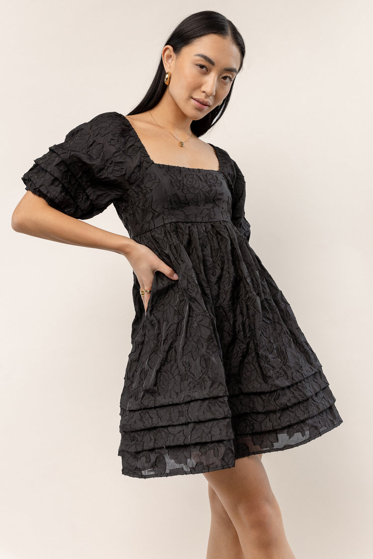 black mini dress with baby doll fit