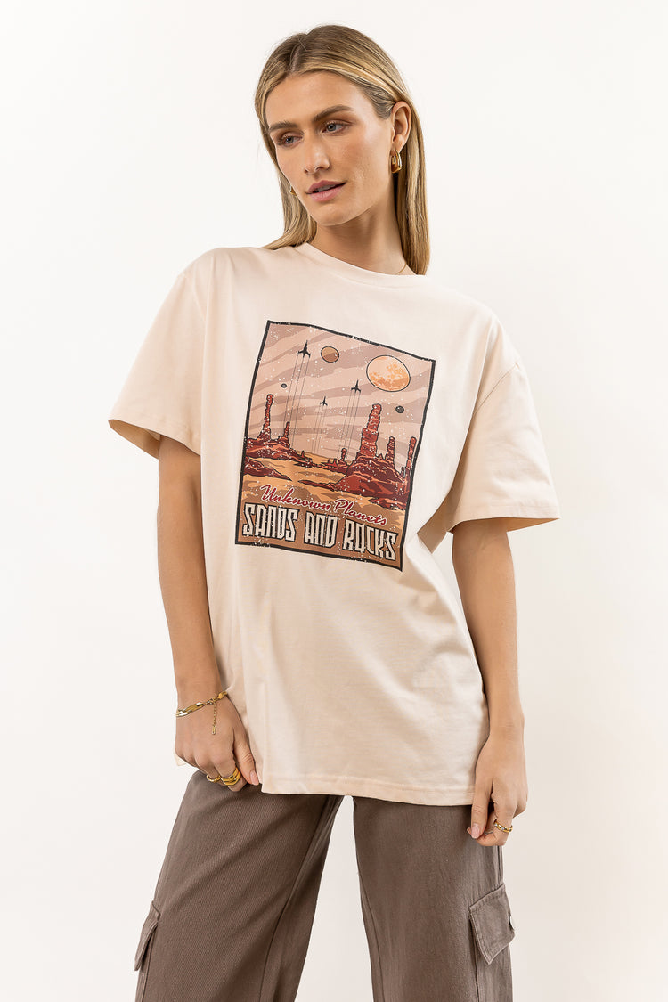 cream oversized tee shirt with plants and rocks graphic
