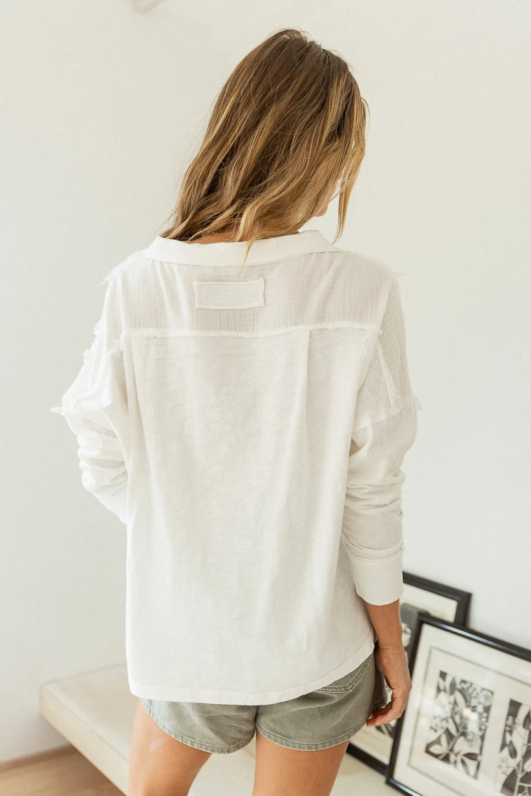 long sleeve white top with inside out detail