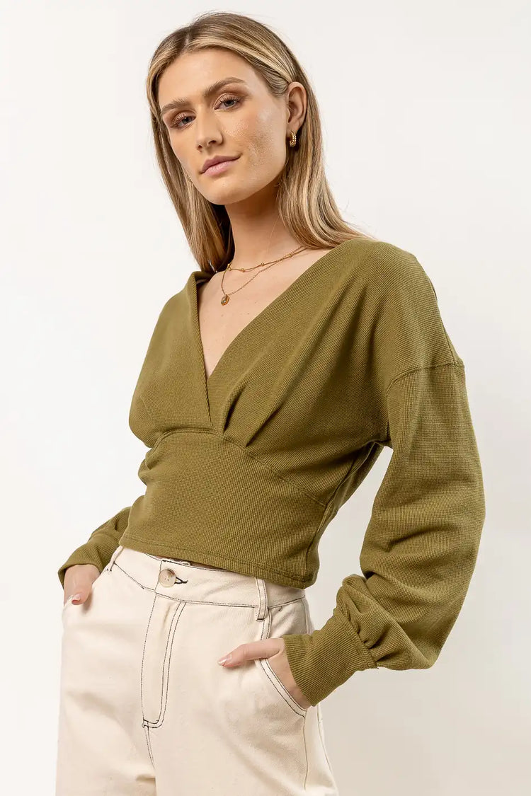 green crop sweater with long sleeves